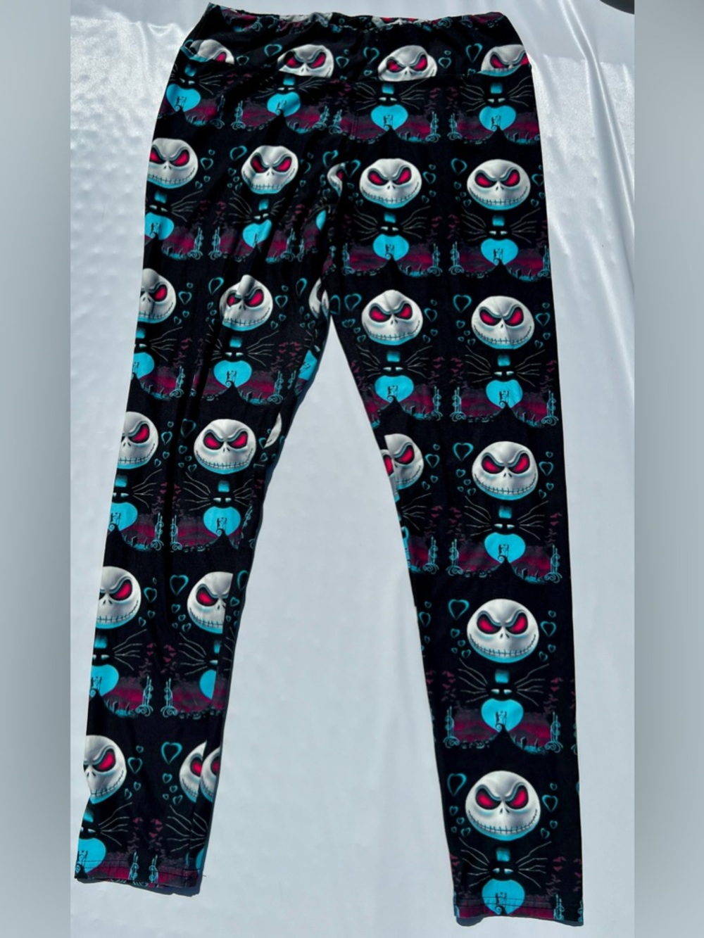 Black Skull-Print Leggings with Teal & Pink Accents